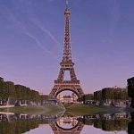 The Eiffel Tower and its reflection