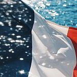 French flag on a sea background